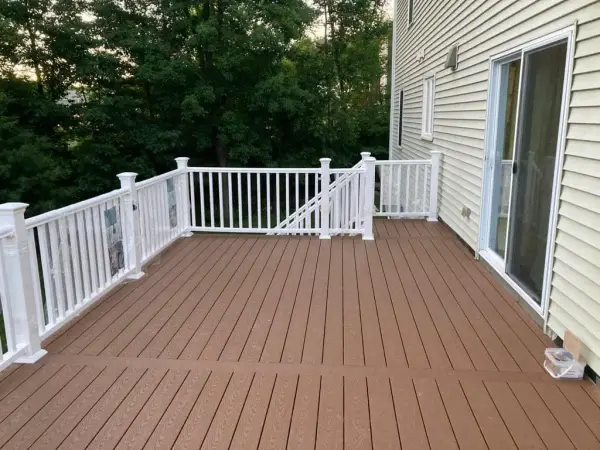 Expansive multi-tiered composite deck showcase in Weston, MA